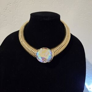 Lustrous Gold Coil Necklace with Iridescent Gem